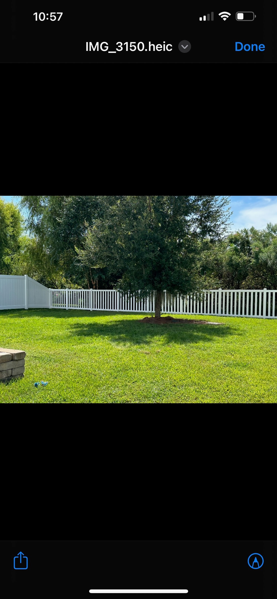 White picket fence with lawn
