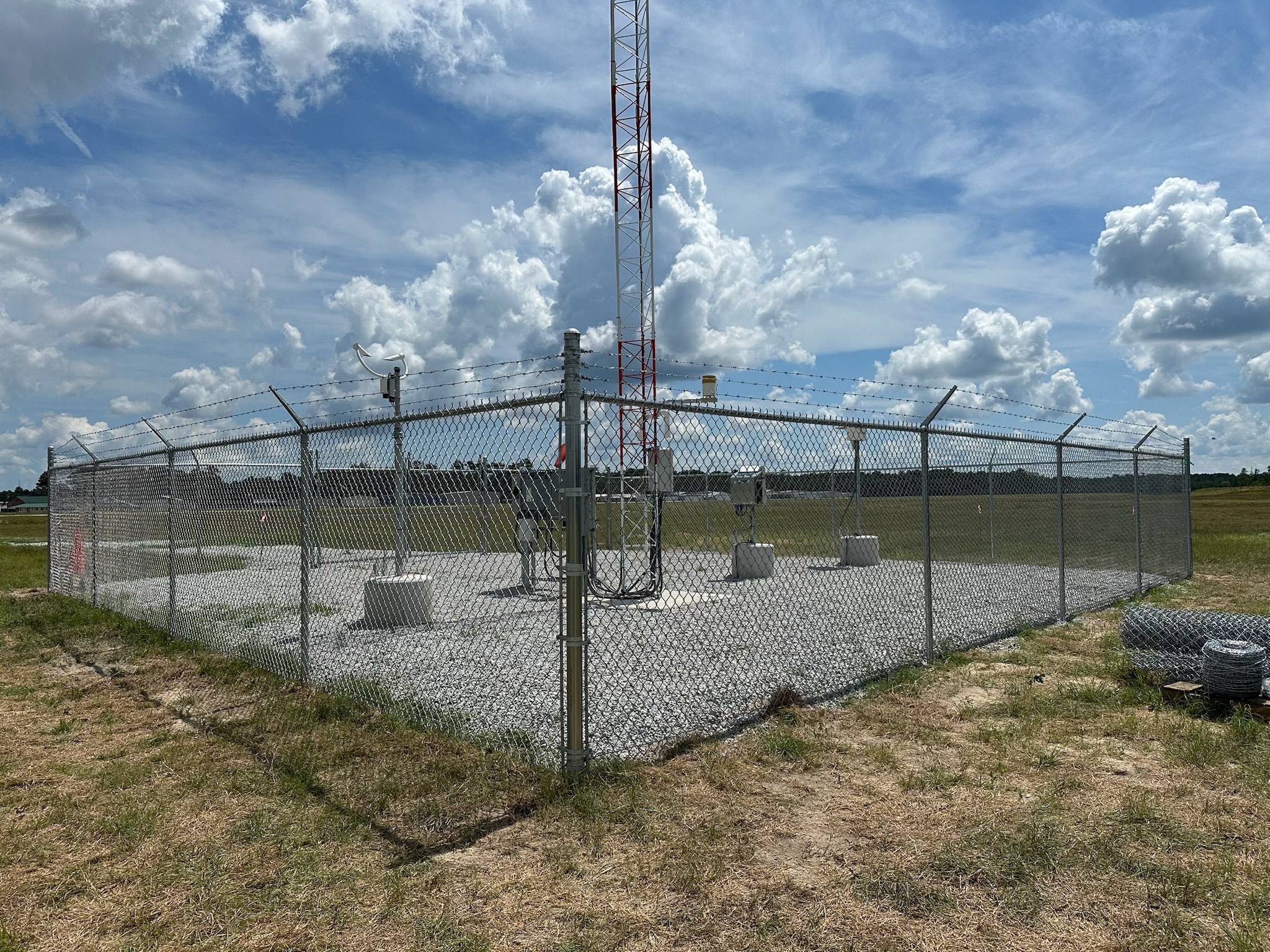 Commercial chain link fence at communications tower