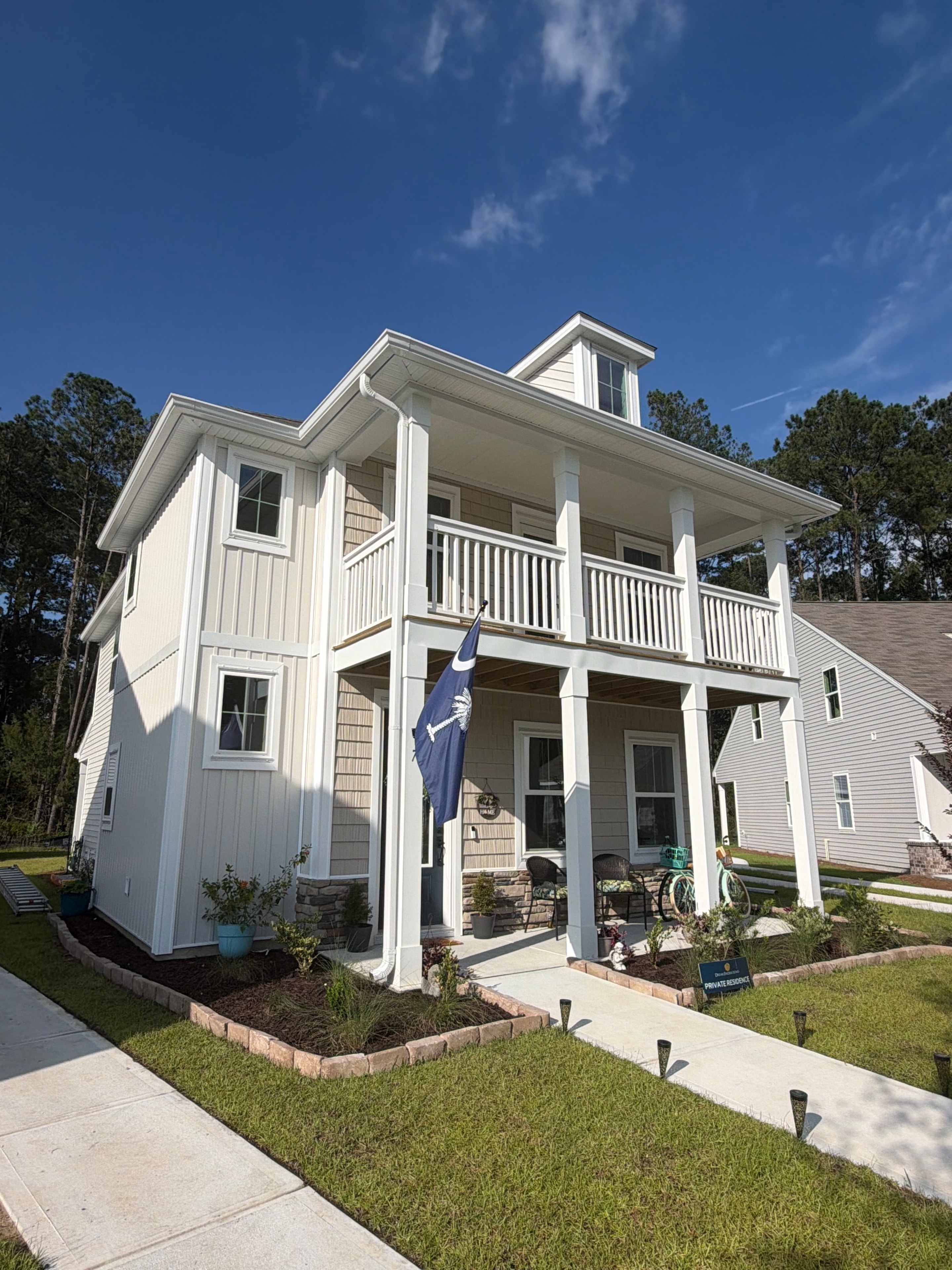 White gutters on beautiful Bluffton home exterior